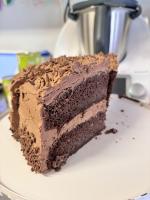 One cake split into two tins.