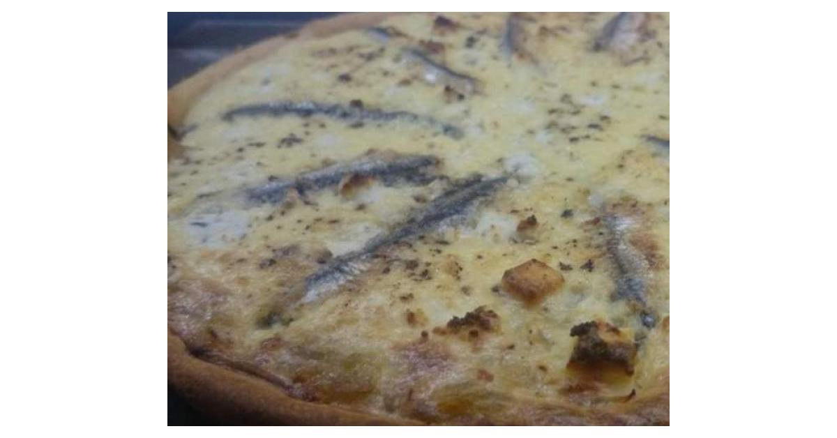 Goats cheese, onion jam and white anchovy tart by krispykitchen. A