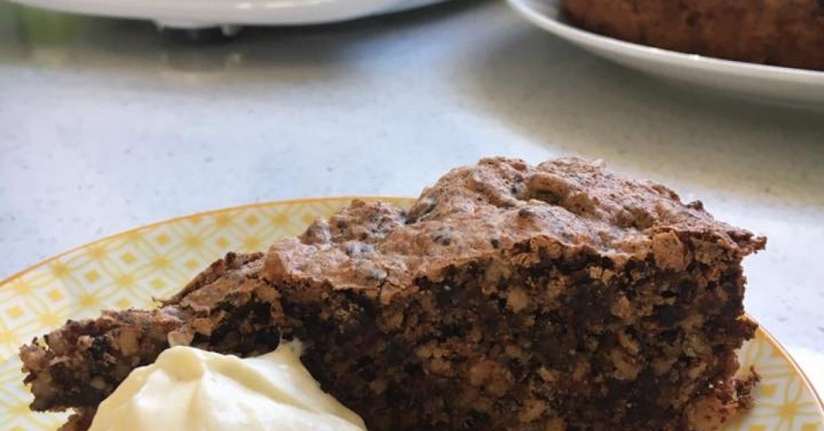 Chocolate, Almond and Date Meringue Cake by Mixing With Riss. A