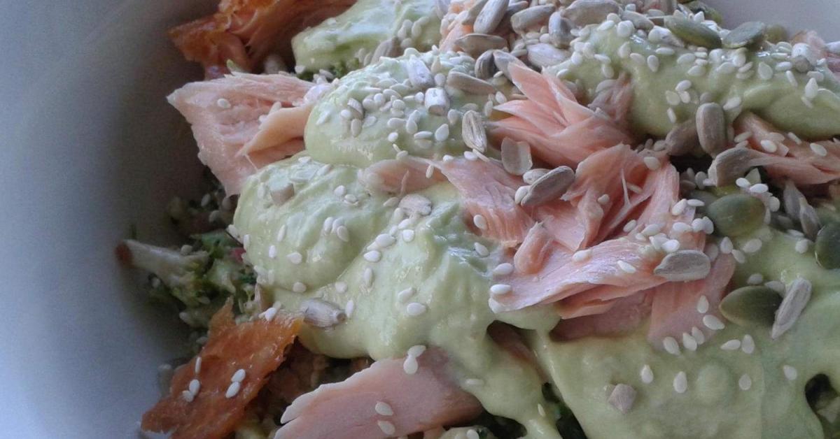 RAW BROCCOLI SALAD TOSSED WITH SMOKED SALMON, BLACK OLIVES AND CREAMY AVOCADO DRESSING by