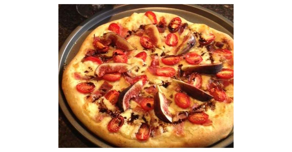 Pesto Pizza with Prosciutto, Mozzarella and Fig by Gayle Rowan. A